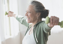 Older woman exercising with light weights