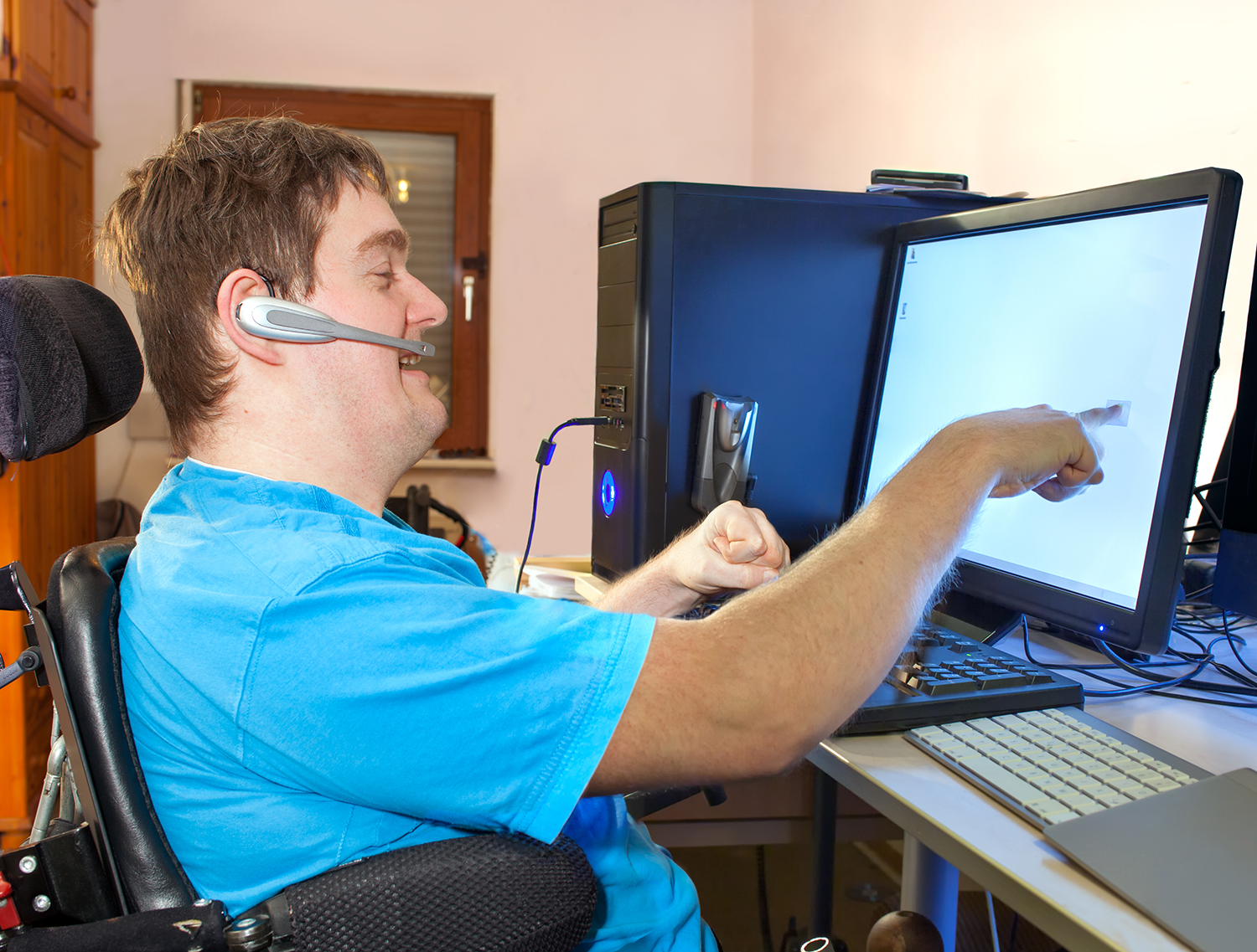 man with disability using computer