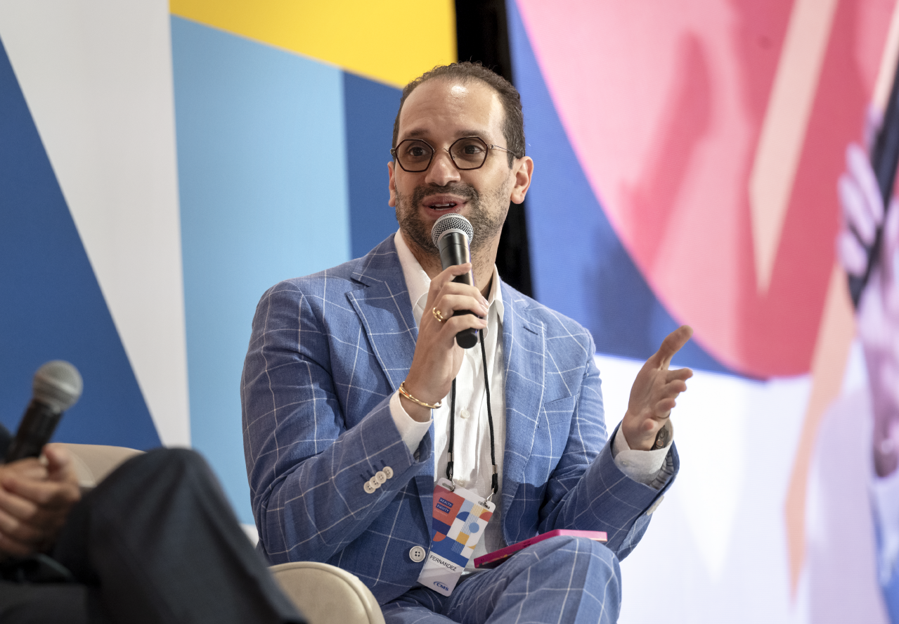 Man speaking at a podium